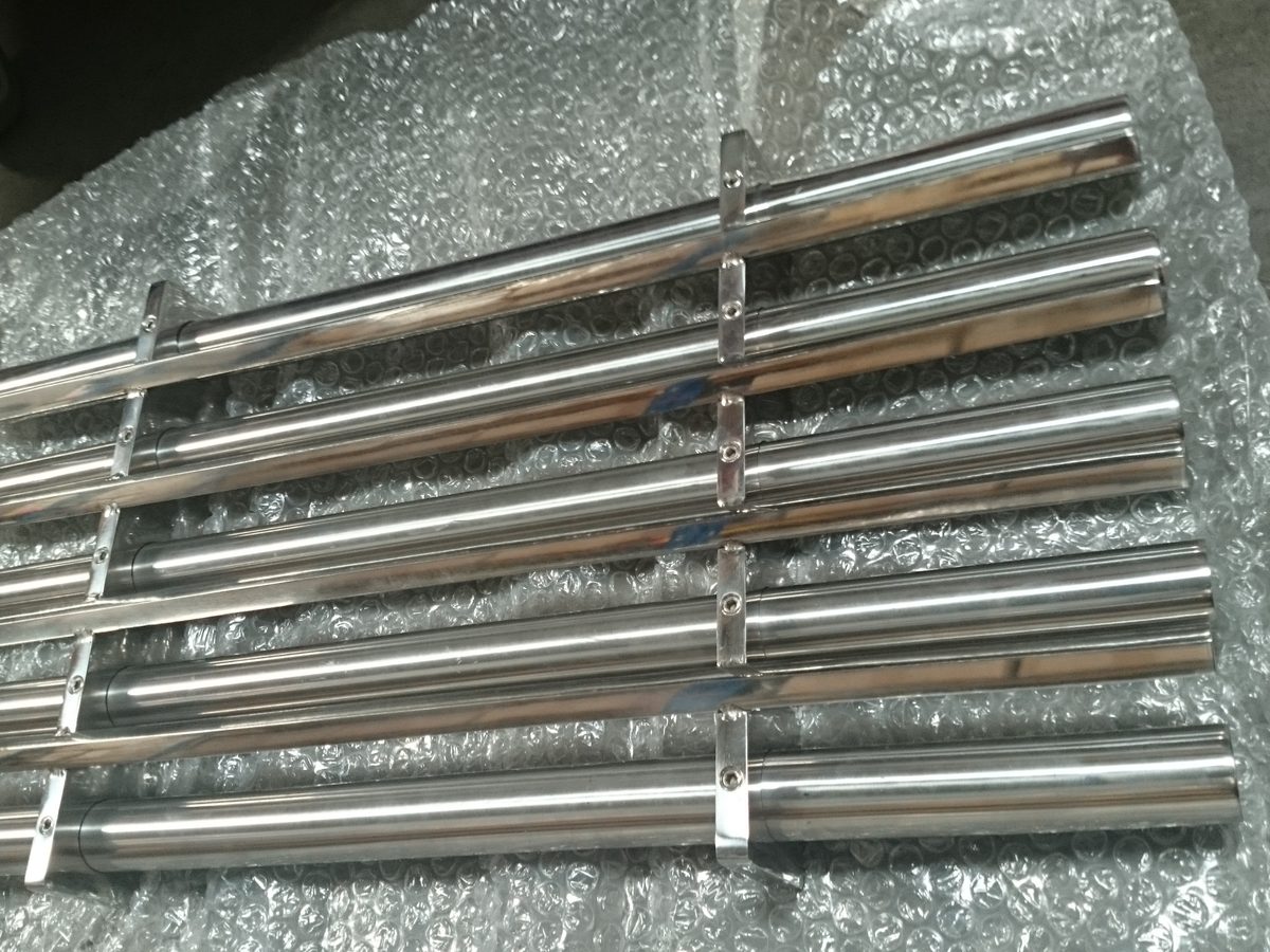 Large grate magnet with thick polished stainless steel magnetic bars in a cross frame